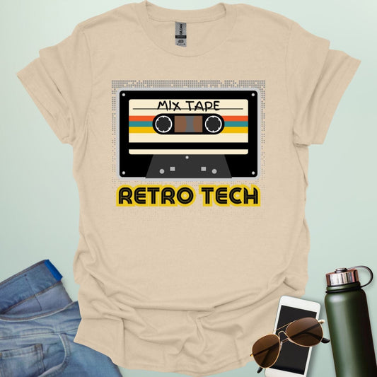 Retro cassette mix-tape graphic on tech-nostalgia tee with geometric patterns and 80s/90s style.