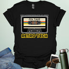 Retro cassette mix-tape graphic on tech-nostalgia tee with geometric patterns and 80s/90s style.