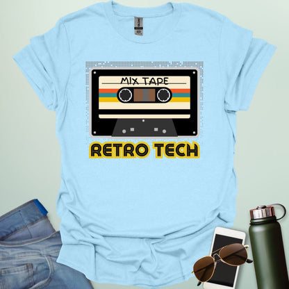 Retro cassette mix-tape graphic on tech-nostalgia tee with geometric patterns and 80s/90s style.