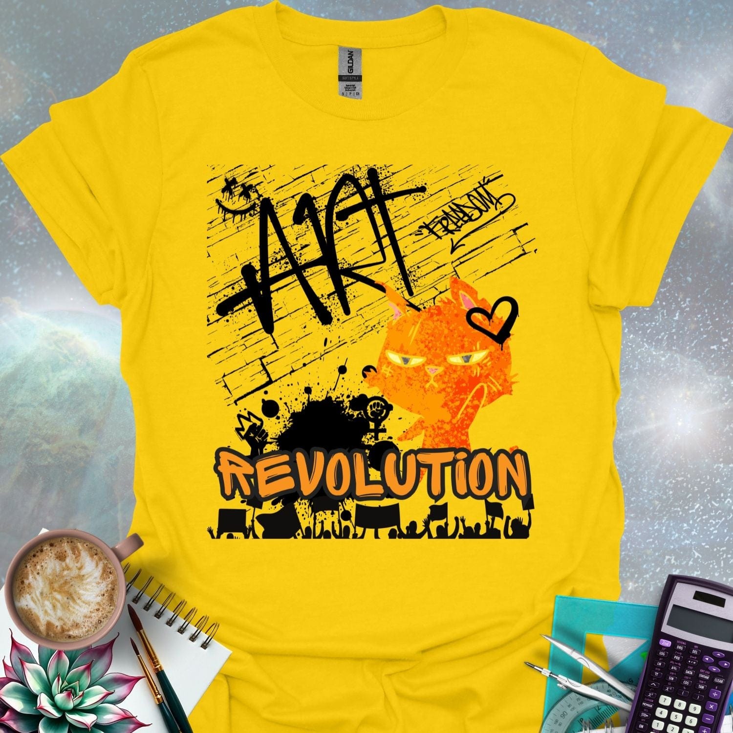 The word 'ART' in a bold, black graffiti style above an orange cartoon cat with a determined expression and a heart graphic. Below is the word 'REVOLUTION' in orange outlined in black, above a silhouette of a crowd holding signs.