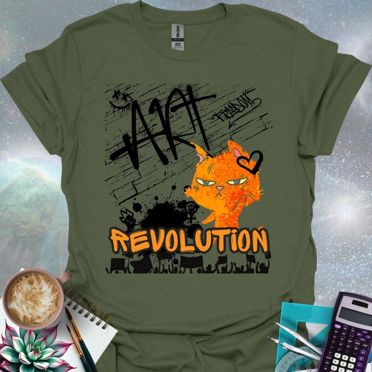 The word 'ART' in a bold, black graffiti style above an orange cartoon cat with a determined expression and a heart graphic. Below is the word 'REVOLUTION' in orange outlined in black, above a silhouette of a crowd holding signs.