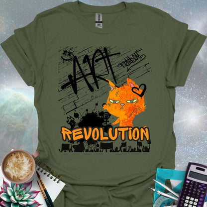 The word 'ART' in a bold, black graffiti style above an orange cartoon cat with a determined expression and a heart graphic. Below is the word 'REVOLUTION' in orange outlined in black, above a silhouette of a crowd holding signs.