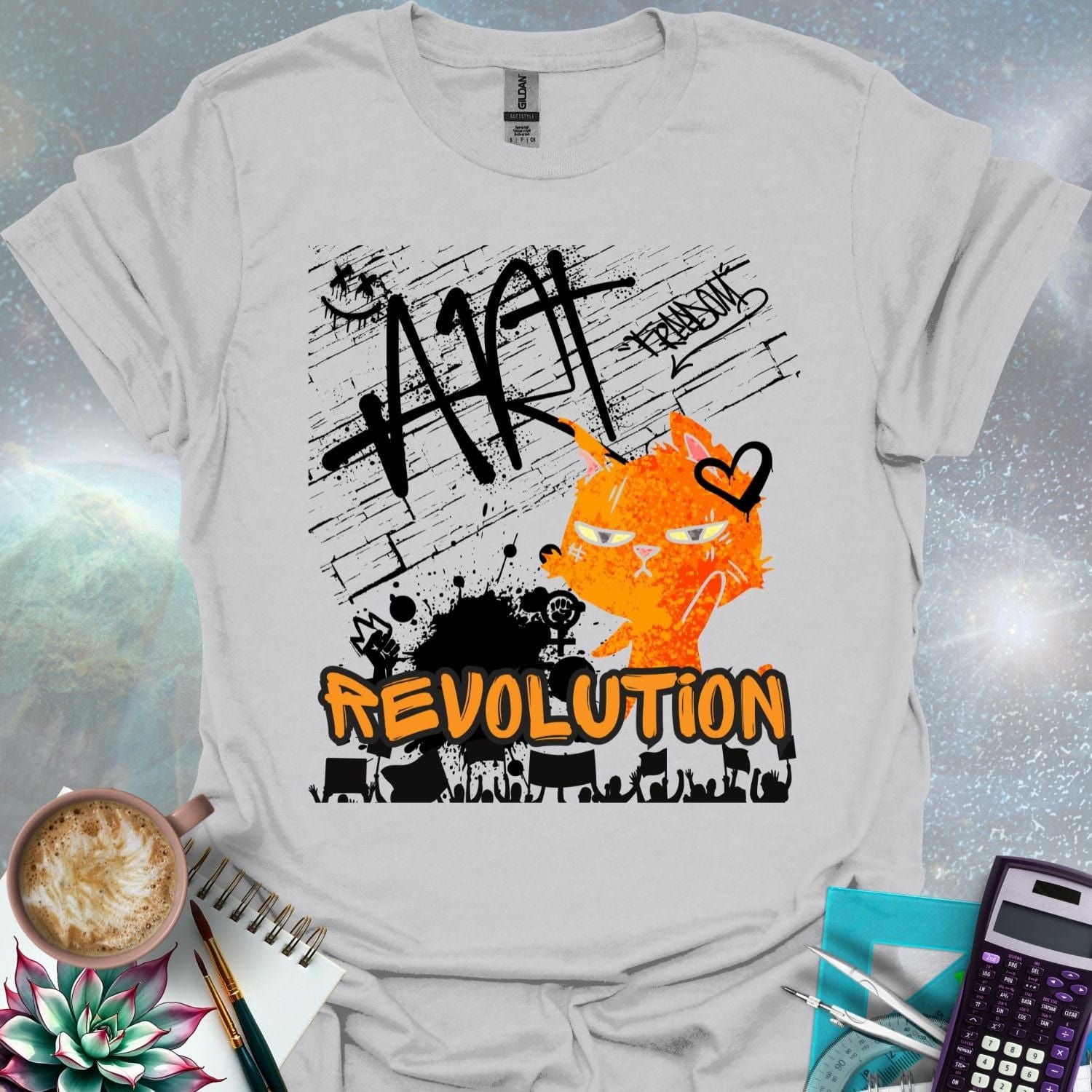 The word 'ART' in a bold, black graffiti style above an orange cartoon cat with a determined expression and a heart graphic. Below is the word 'REVOLUTION' in orange outlined in black, above a silhouette of a crowd holding signs.