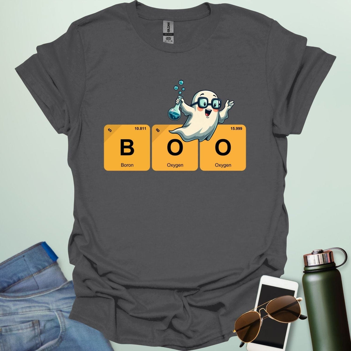 BOO Ghostly Compound t-shirt with bold text and spooky Halloween chemistry theme — funny STEM Halloween design.