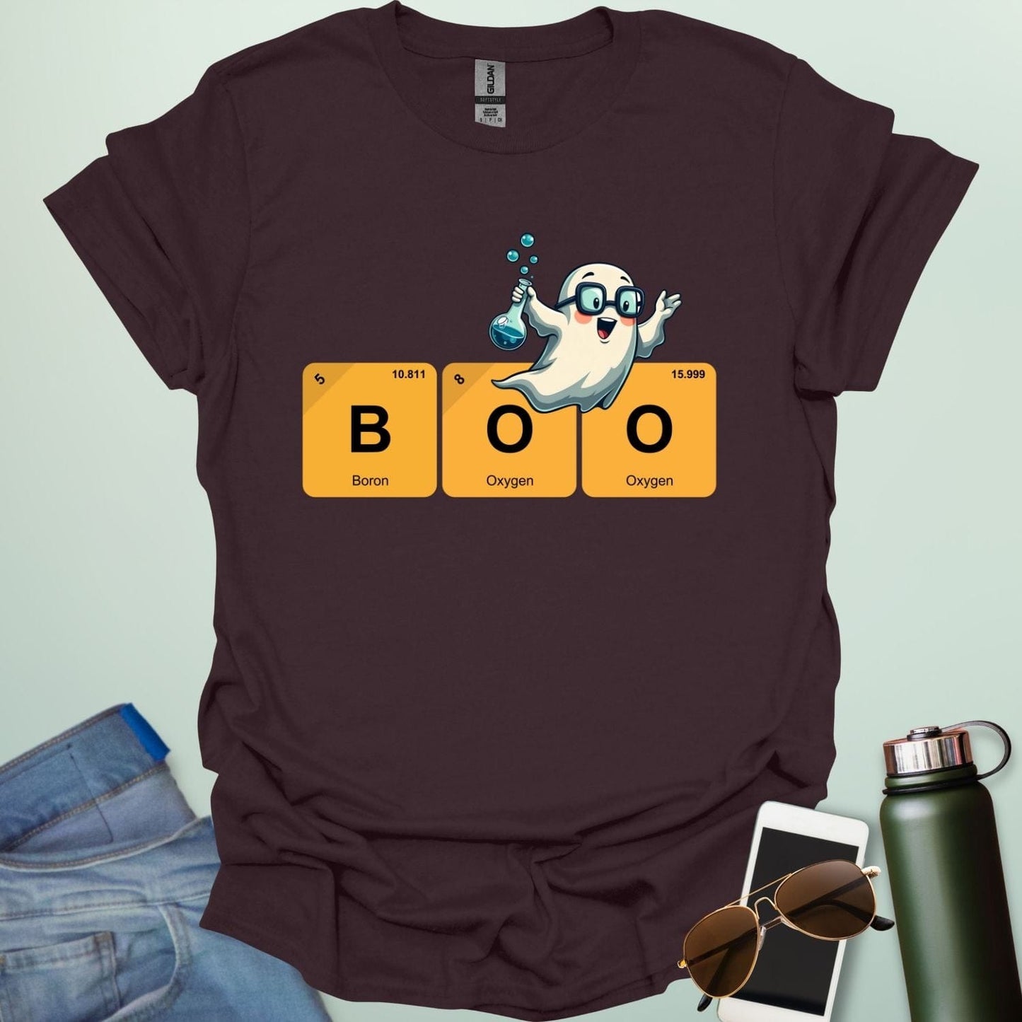 BOO Ghostly Compound t-shirt with bold text and spooky Halloween chemistry theme — funny STEM Halloween design.