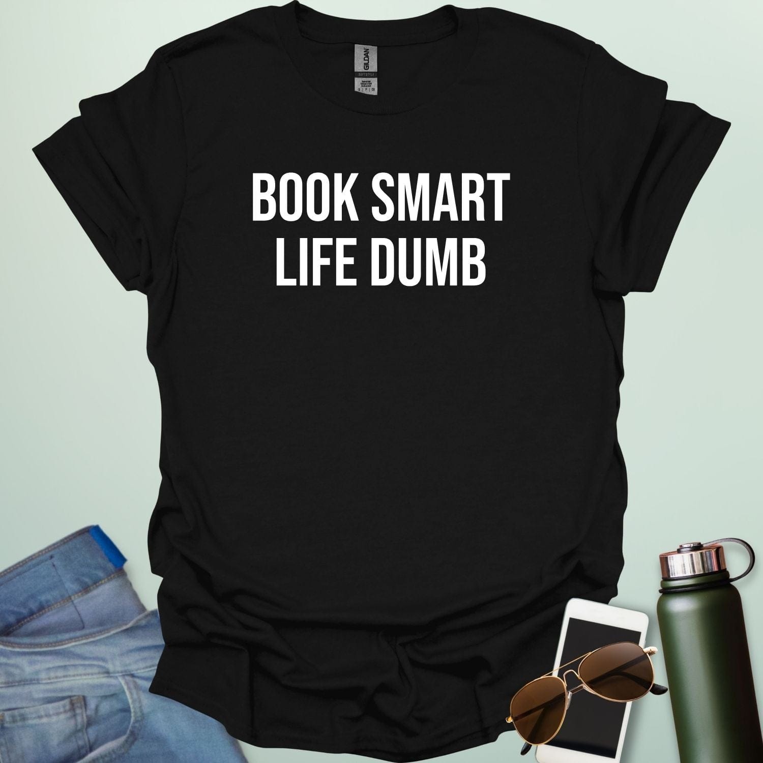 Minimalist typography design featuring the bold, all-caps text "BOOK SMART LIFE DUMB" centered in a clean sans-serif font.