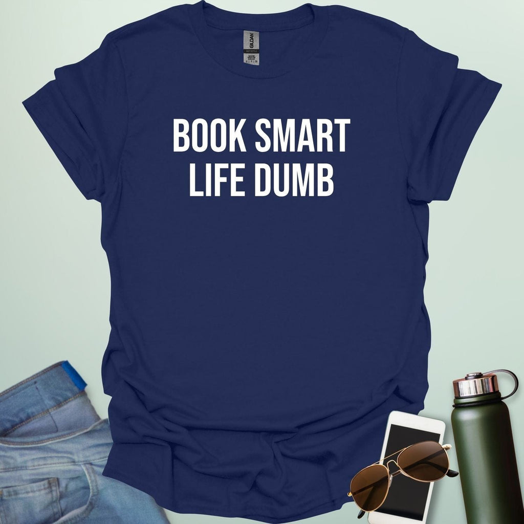 Minimalist typography design featuring the bold, all-caps text "BOOK SMART LIFE DUMB" centered in a clean sans-serif font.