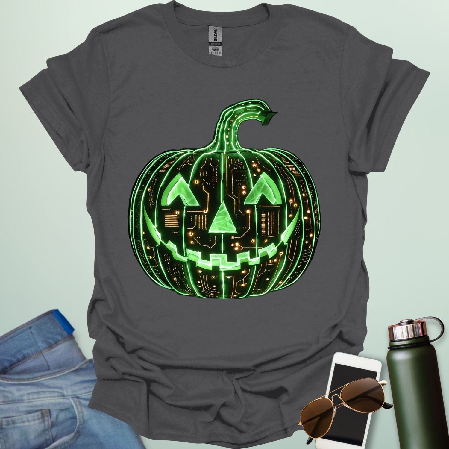 Pumpkin Tech t-shirt with glowing green jack-o-lantern circuit board design — Halloween STEM geek apparel.