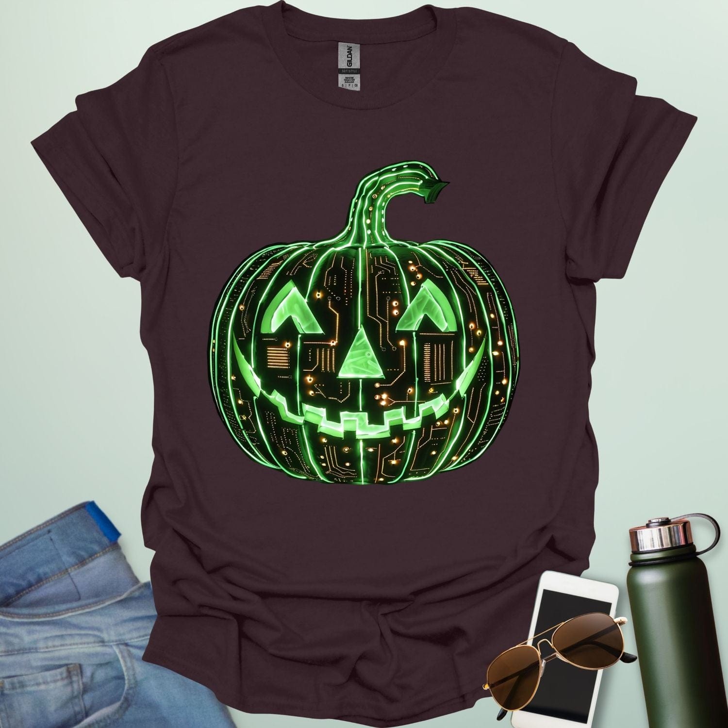 Pumpkin Tech t-shirt with glowing green jack-o-lantern circuit board design — Halloween STEM geek apparel.