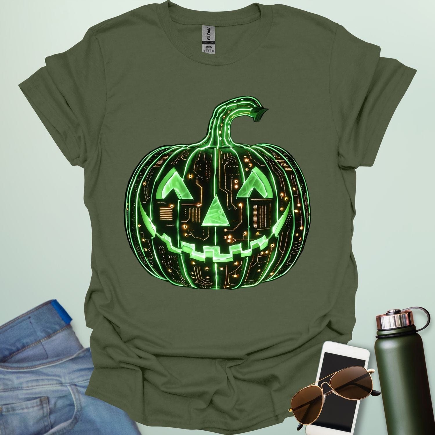 Pumpkin Tech t-shirt with glowing green jack-o-lantern circuit board design — Halloween STEM geek apparel.
