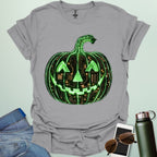 Pumpkin Tech t-shirt with glowing green jack-o-lantern circuit board design — Halloween STEM geek apparel.
