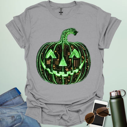 Pumpkin Tech t-shirt with glowing green jack-o-lantern circuit board design — Halloween STEM geek apparel.