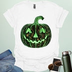 Pumpkin Tech t-shirt with glowing green jack-o-lantern circuit board design — Halloween STEM geek apparel.