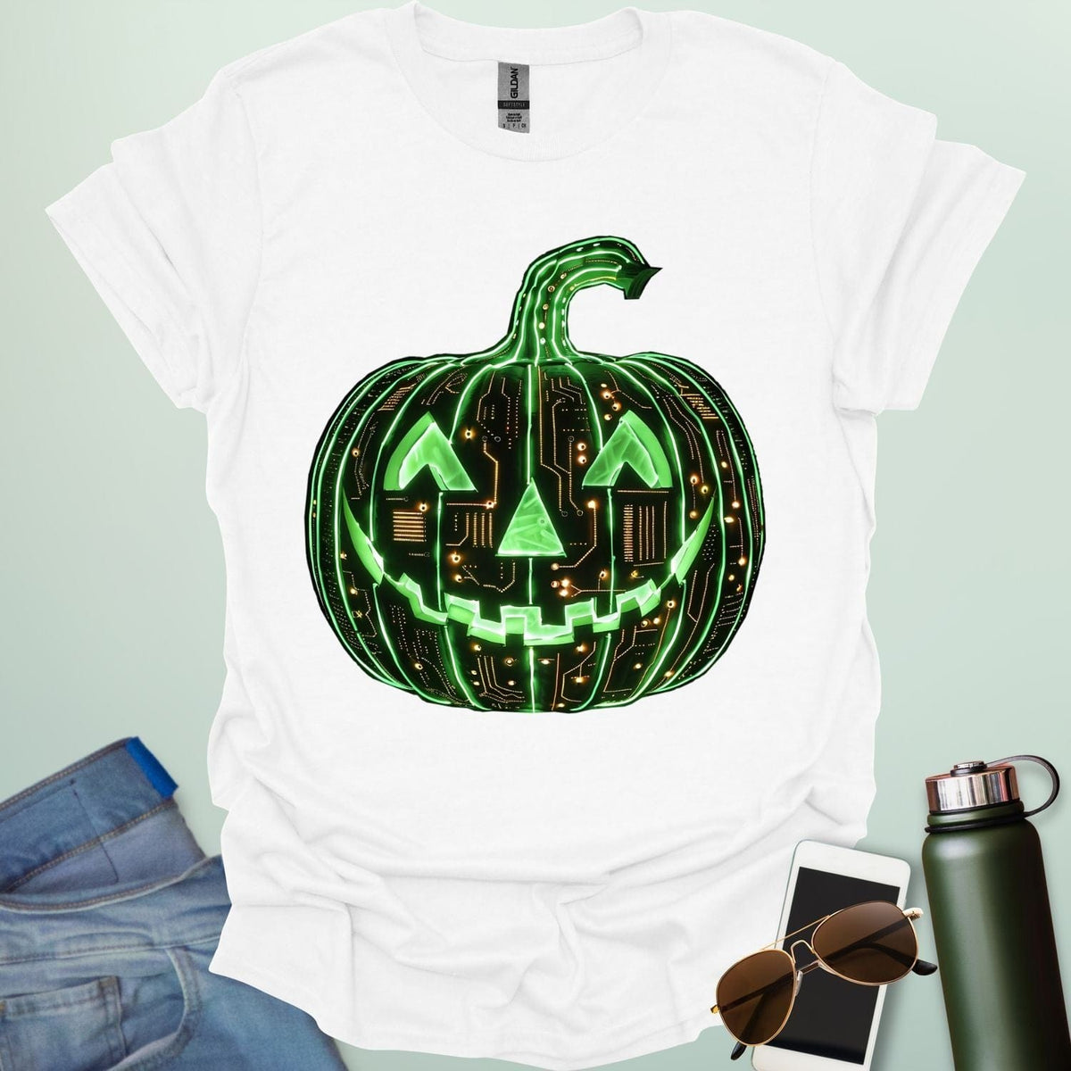 Pumpkin Tech t-shirt with glowing green jack-o-lantern circuit board design — Halloween STEM geek apparel.