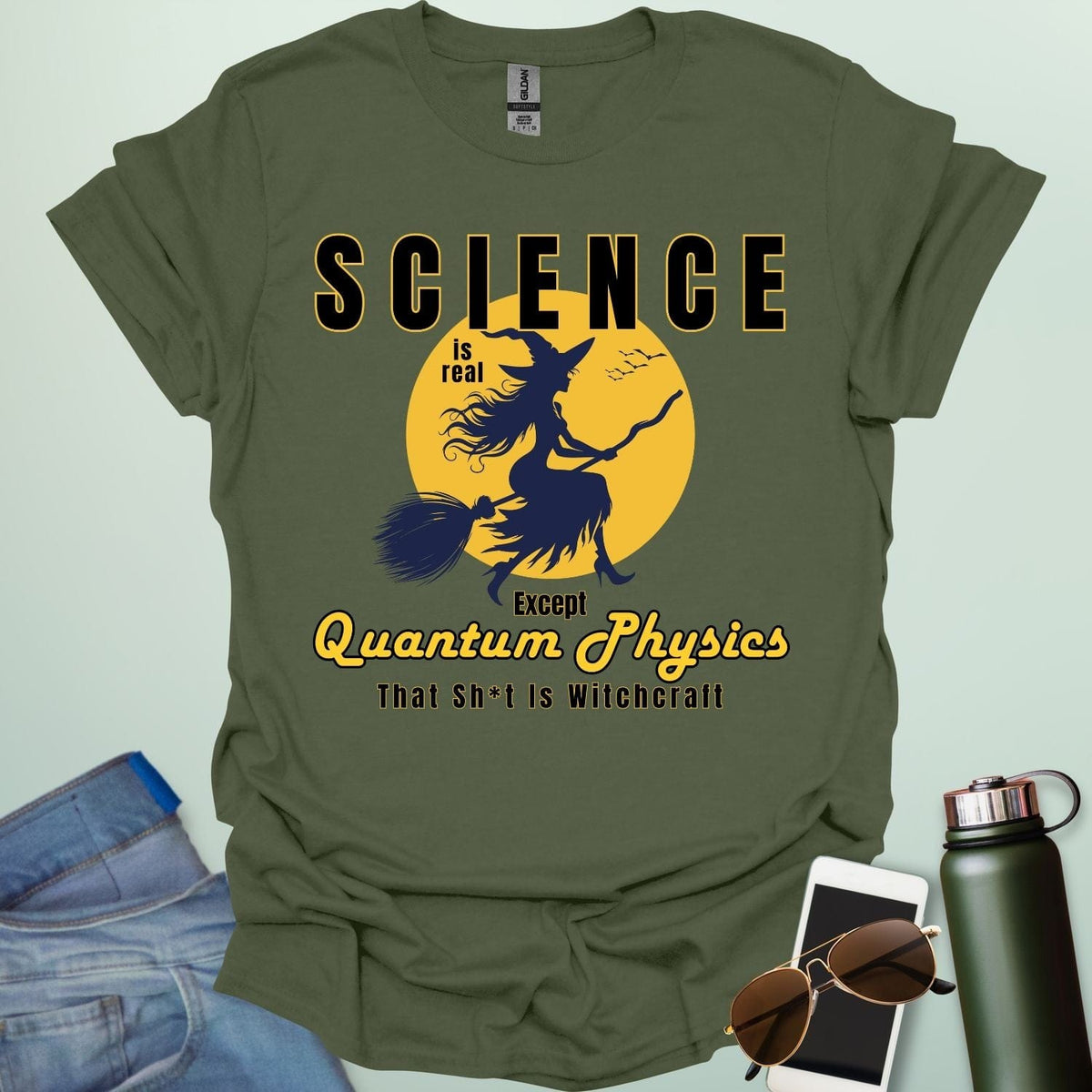 Quantum Physics Is Witchcraft t-shirt with bold typography — combining quantum physics and witchcraft themes for science & supernatural fans.