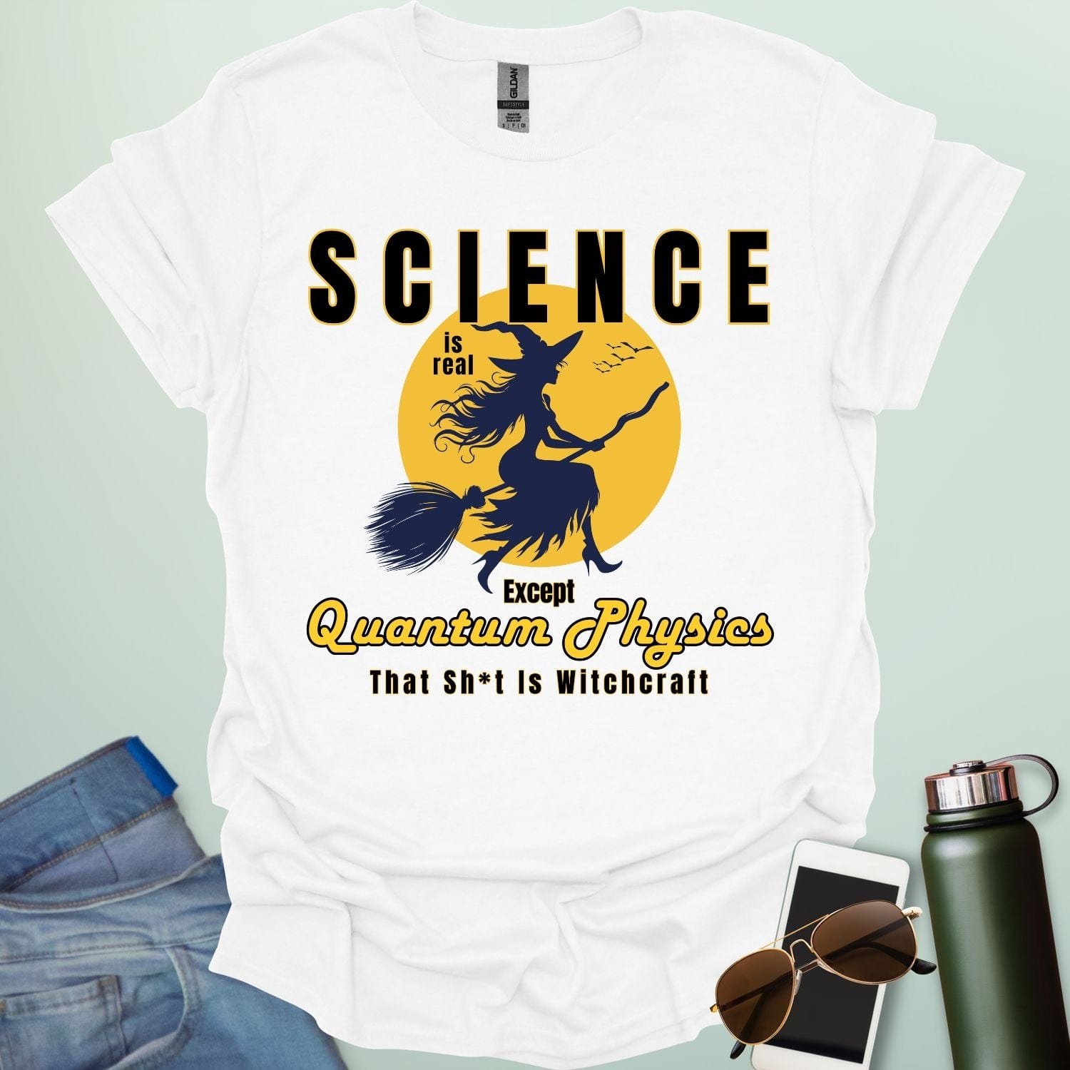 Quantum Physics Is Witchcraft t-shirt with bold typography — combining quantum physics and witchcraft themes for science & supernatural fans.