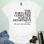 A white t-shirt with the text 'THE TORTURED COMPUTER SCIENCE DEPARTMENT est. 2024' and 'All's fair in love and coding.'