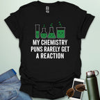 "My Chemistry Puns Rarely Get a Reaction' t-shirt with a humorous science pun design.