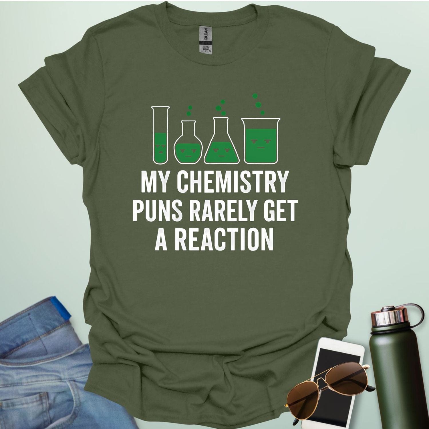 "My Chemistry Puns Rarely Get a Reaction' t-shirt with a humorous science pun design.