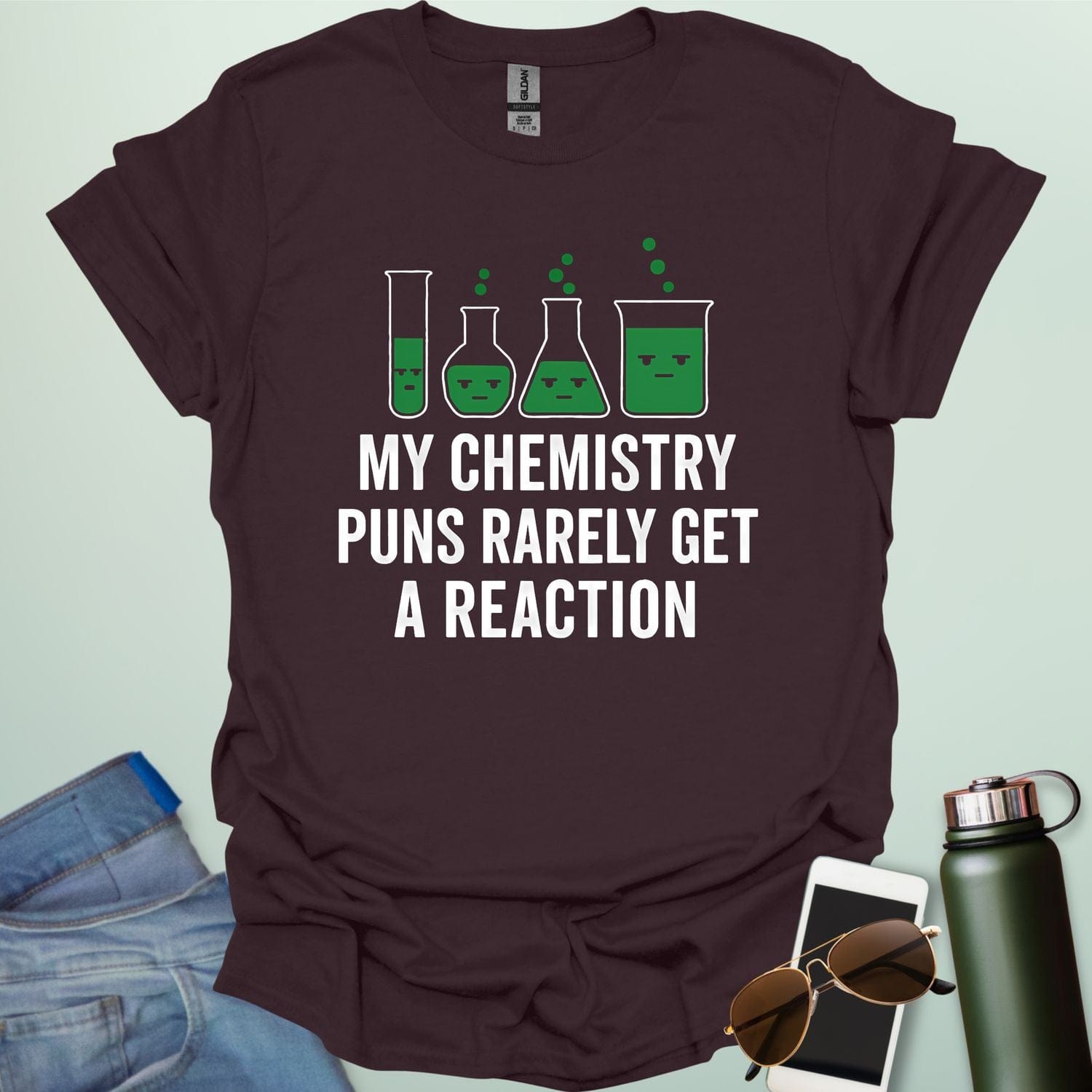 "My Chemistry Puns Rarely Get a Reaction' t-shirt with a humorous science pun design.