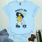 Don't Be Salty t-shirt with a retro-style illustration and the chemical symbols for salt, NaCl.