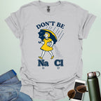Don't Be Salty t-shirt with a retro-style illustration and the chemical symbols for salt, NaCl.