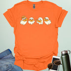 Western Ghost Readers t-shirt featuring ghostly figures reading books and sipping coffee in a western-style design — perfect for book lovers & Halloween.