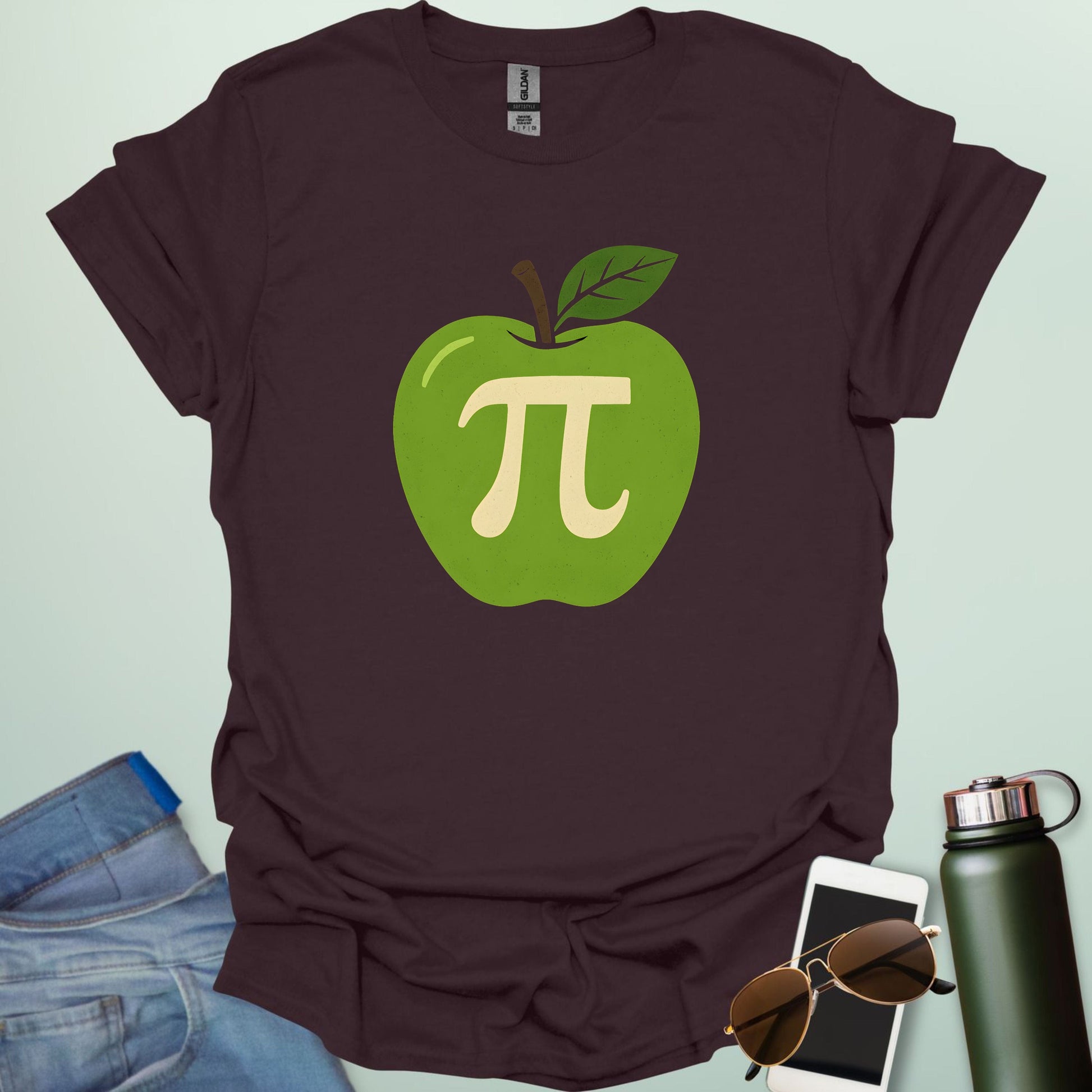 Apple Pi' t-shirt with a green apple graphic and a beige-colored Pi symbol inside.