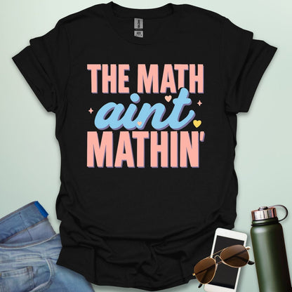 The Math Ain't Mathin'' t-shirt with stylized pink and blue lettering on a solid background.