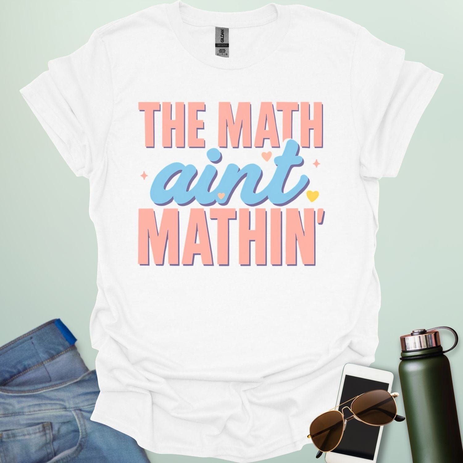 The Math Ain't Mathin'' t-shirt with stylized pink and blue lettering on a solid background.