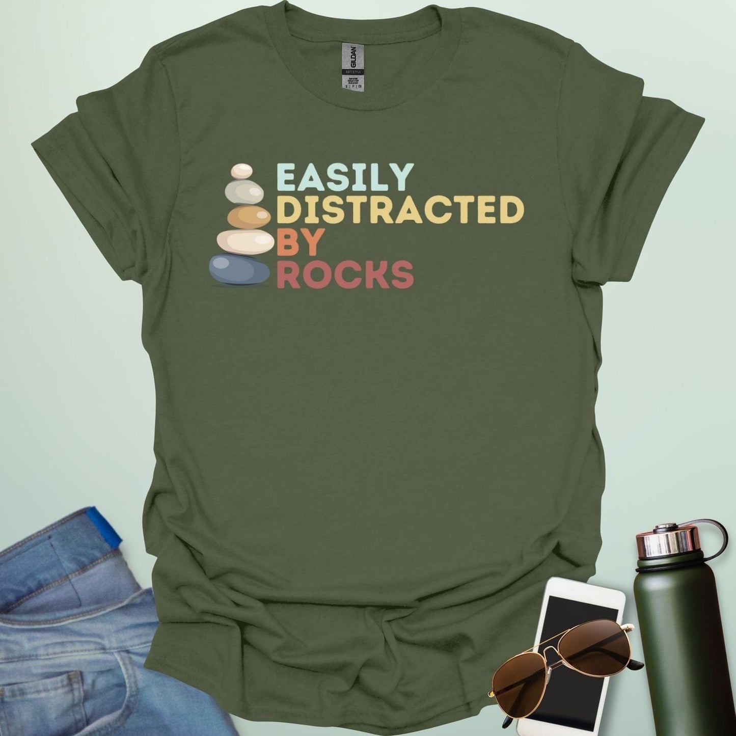 EASILY DISTRACTED BY ROCKS t-shirt with bold text design, funny geology shirt for rockhounds and earth science enthusiasts.