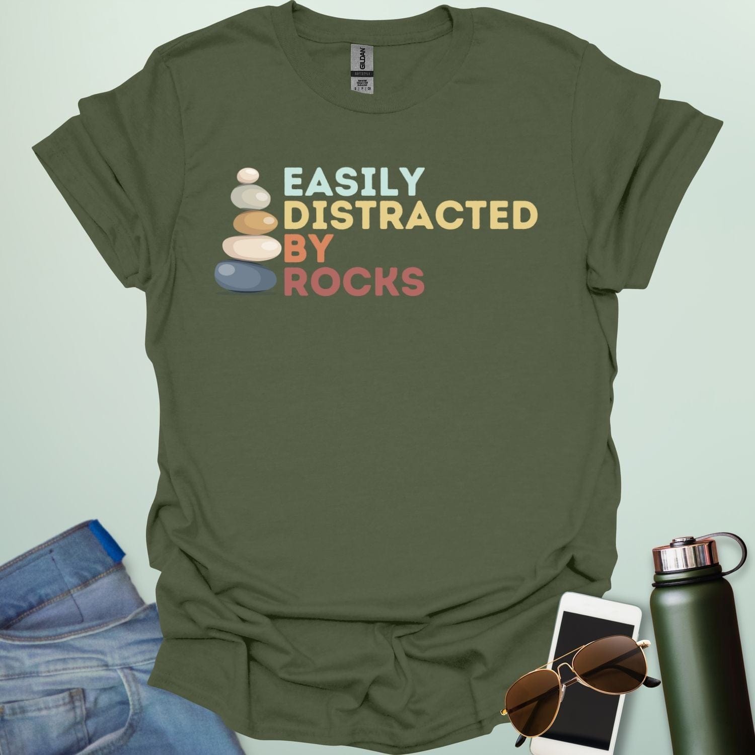 EASILY DISTRACTED BY ROCKS t-shirt with bold text design, funny geology shirt for rockhounds and earth science enthusiasts.
