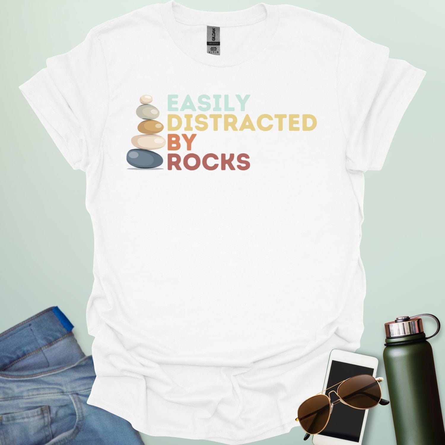 EASILY DISTRACTED BY ROCKS t-shirt with bold text design, funny geology shirt for rockhounds and earth science enthusiasts.