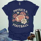 A navy blue t-shirt with a vintage illustration of a football surrounded by flowers and the text 'PHYSICS & FOOTBALL.'