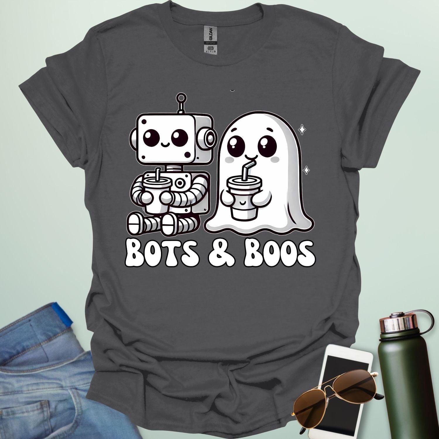 Bots & Boos t-shirt featuring robot/tech imagery with ghostly or spooky accents — a Halloween STEM-robotics design.