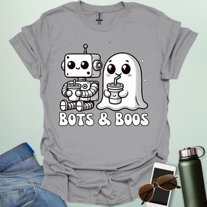 Bots & Boos t-shirt featuring robot/tech imagery with ghostly or spooky accents — a Halloween STEM-robotics design.