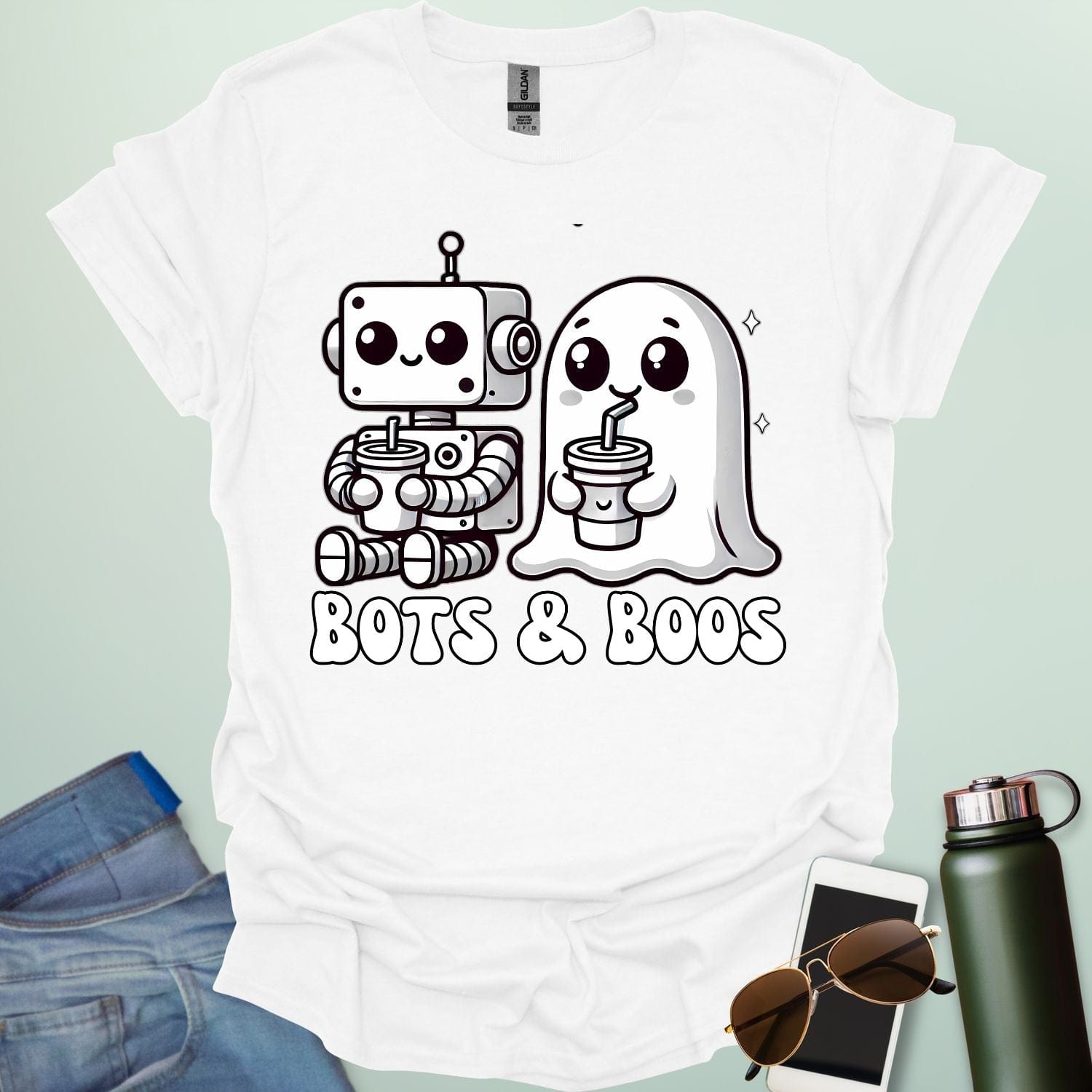 Bots & Boos t-shirt featuring robot/tech imagery with ghostly or spooky accents — a Halloween STEM-robotics design.