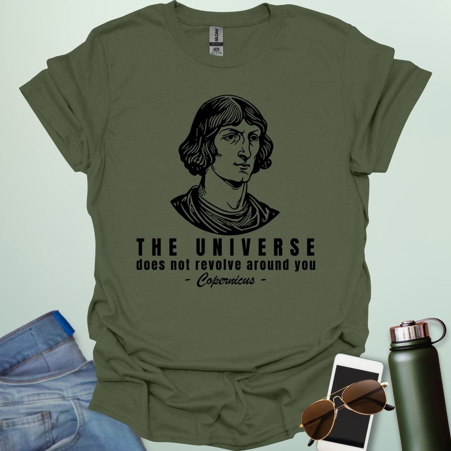 A military green white shirt with a sketch of Copernicus with the text 'The Universe Does Not Revolve Around You' in a bold font.