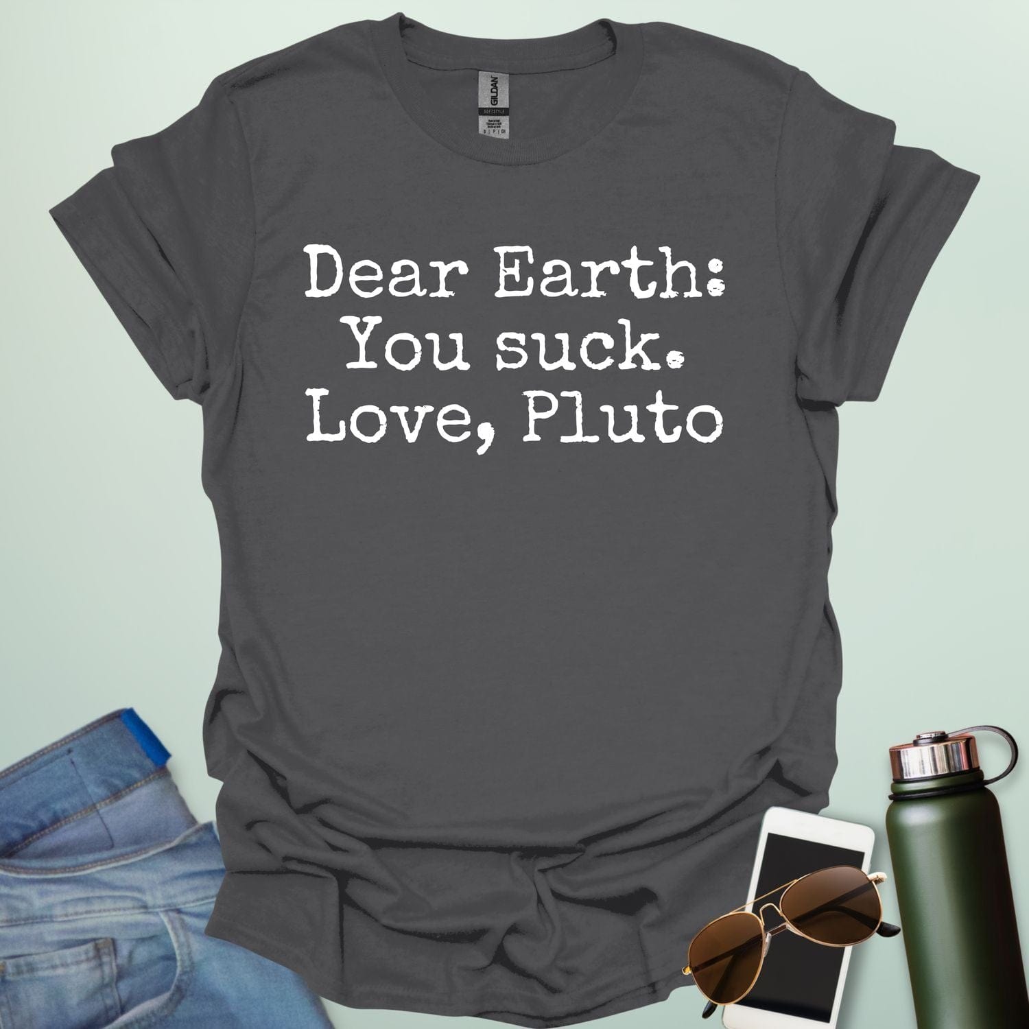 Charcoal Gray t-shirt with humorous text 'Dear Earth: You suck. Love, Pluto'.
