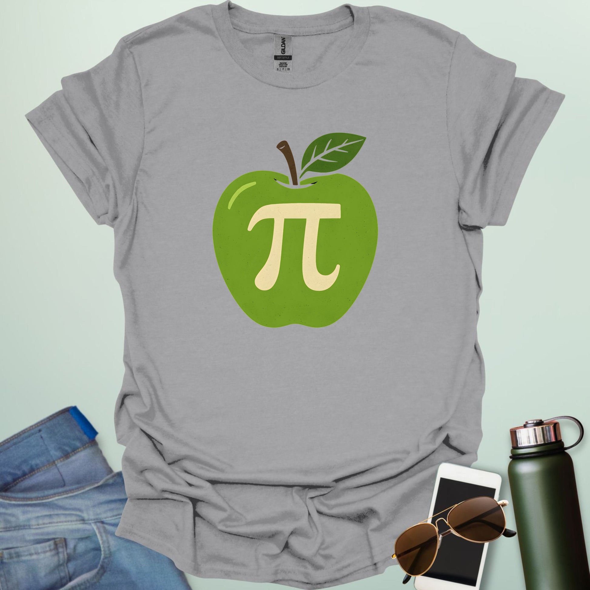 Apple Pi' t-shirt with a green apple graphic and a beige-colored Pi symbol inside.