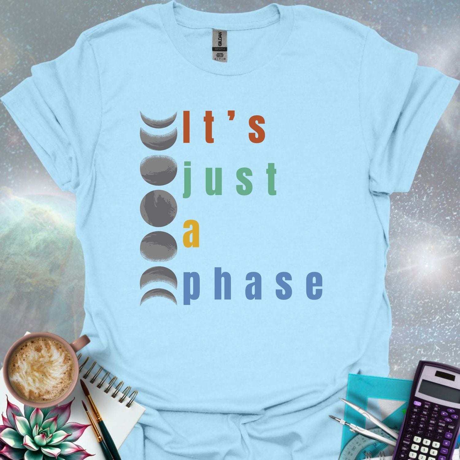 Vertical graphic of the eight moon phases with the text 'It's Just A Phase' in colorful stacked letters.