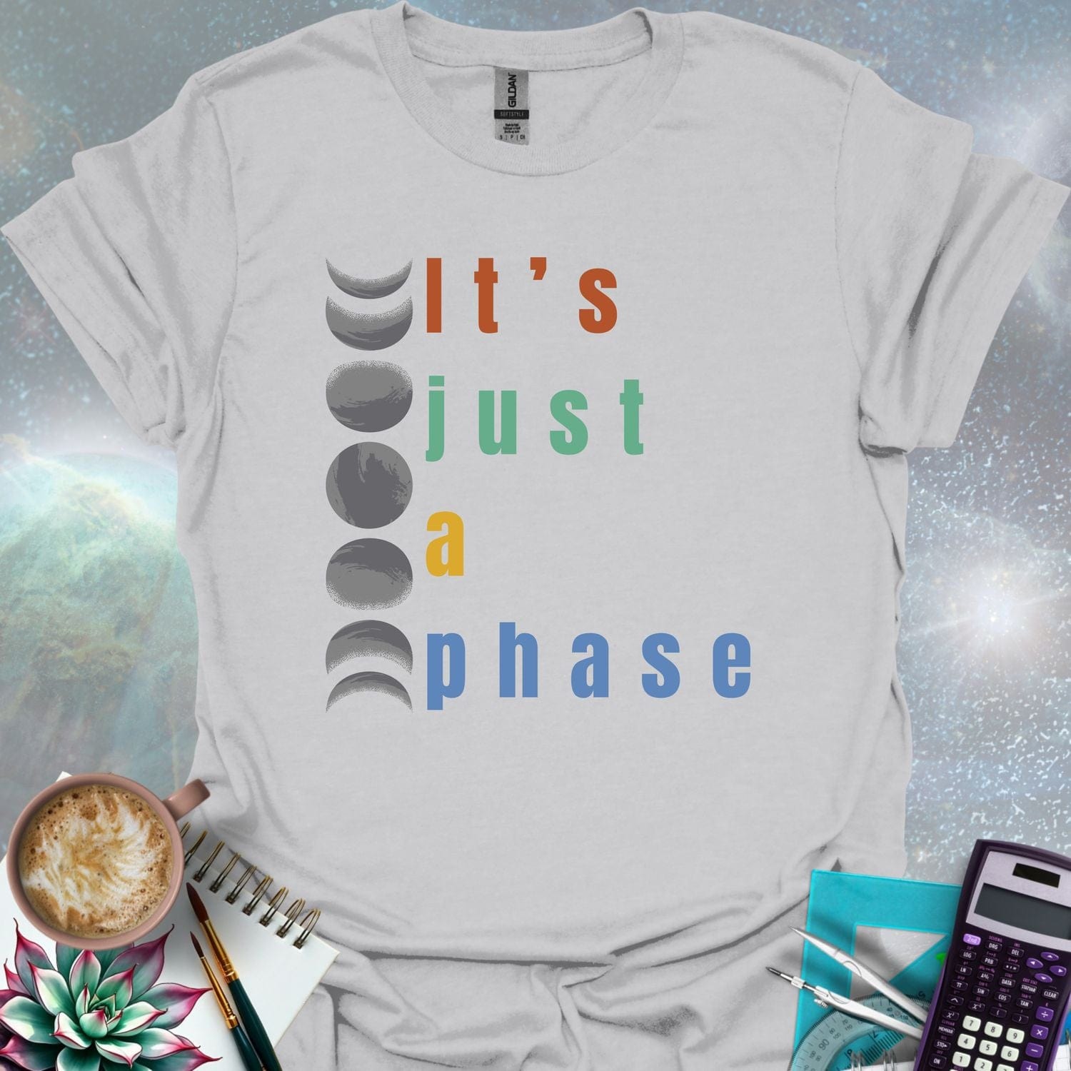 Vertical graphic of the eight moon phases with the text 'It's Just A Phase' in colorful stacked letters.