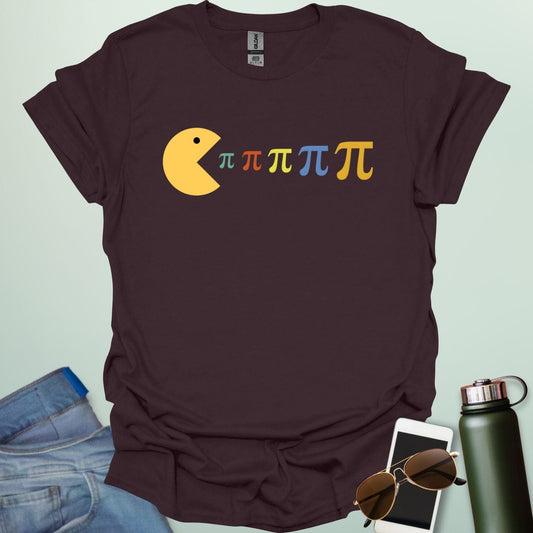 A Pac-Man-like figure eating colorful Pi symbols on a dark blue background.