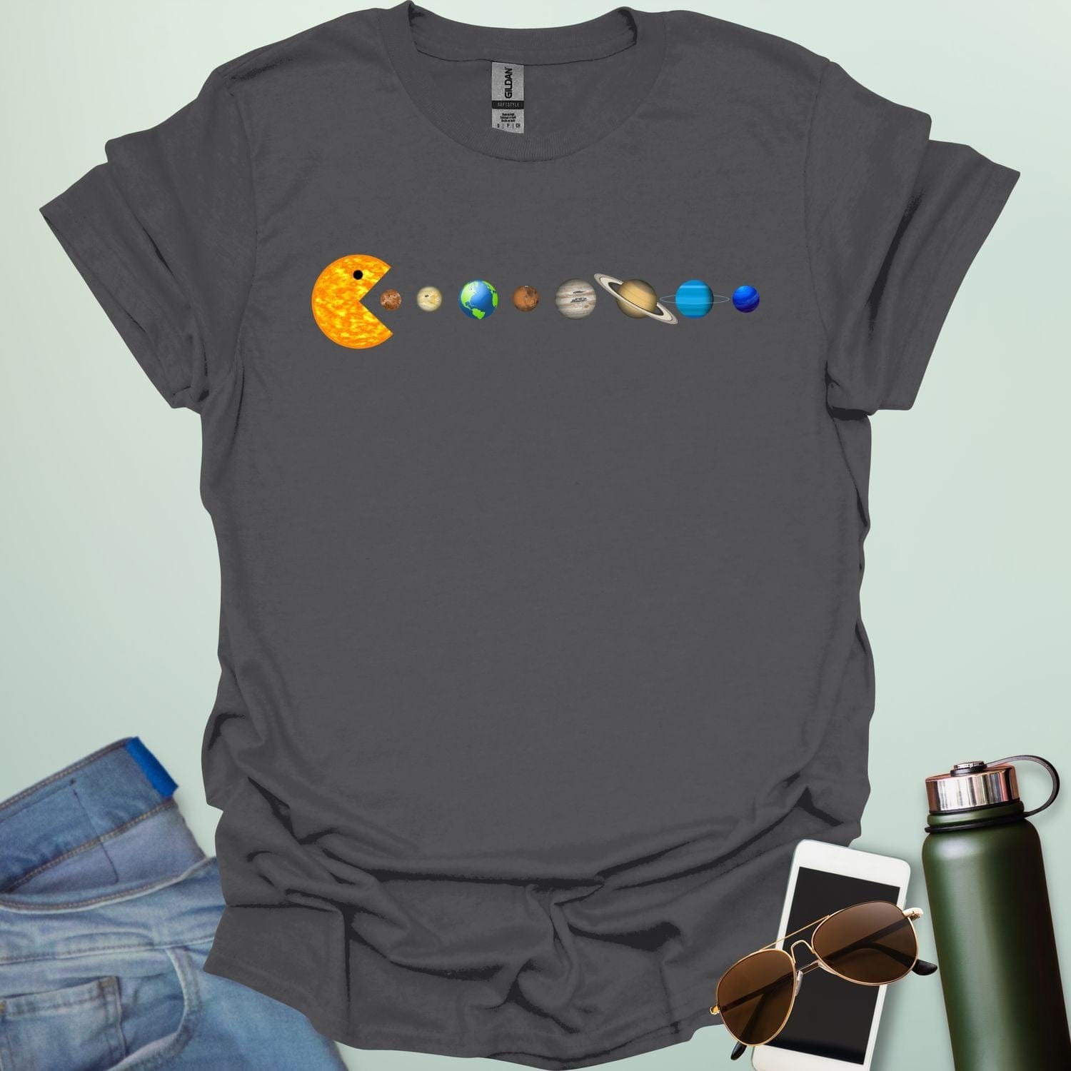 A Pac-Man-like character eating the planets of the solar system, with the sun as its mouth.