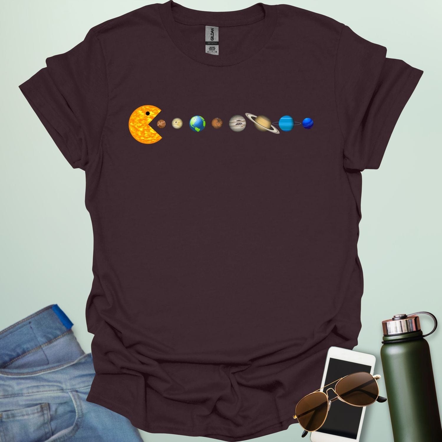 A Pac-Man-like character eating the planets of the solar system, with the sun as its mouth.