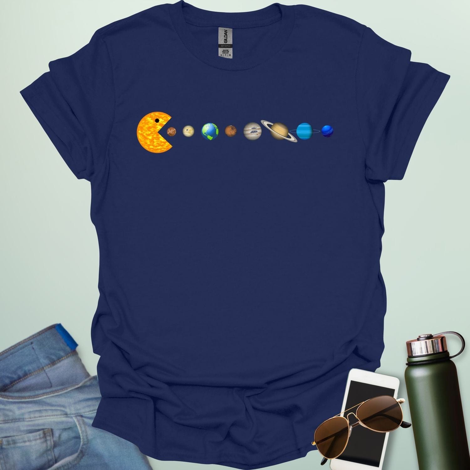A Pac-Man-like character eating the planets of the solar system, with the sun as its mouth.