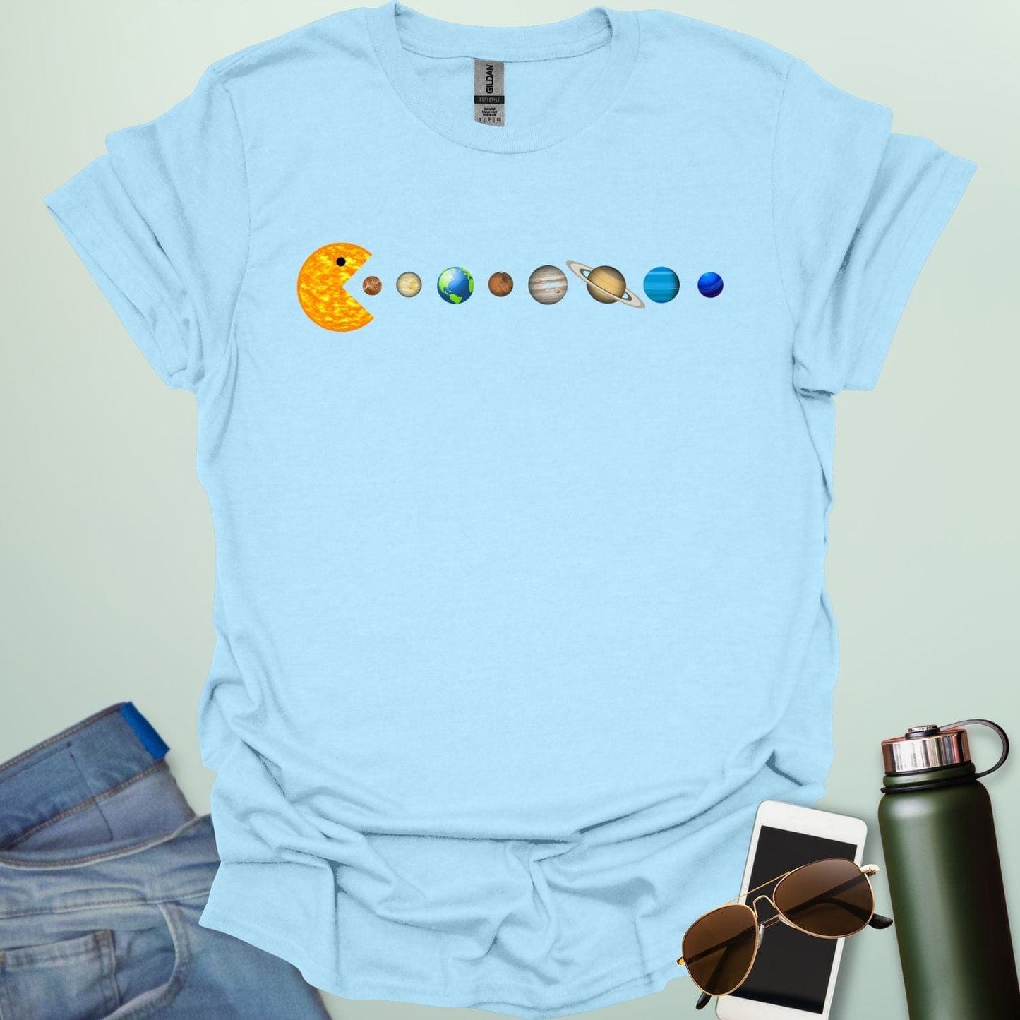 A Pac-Man-like character eating the planets of the solar system, with the sun as its mouth.