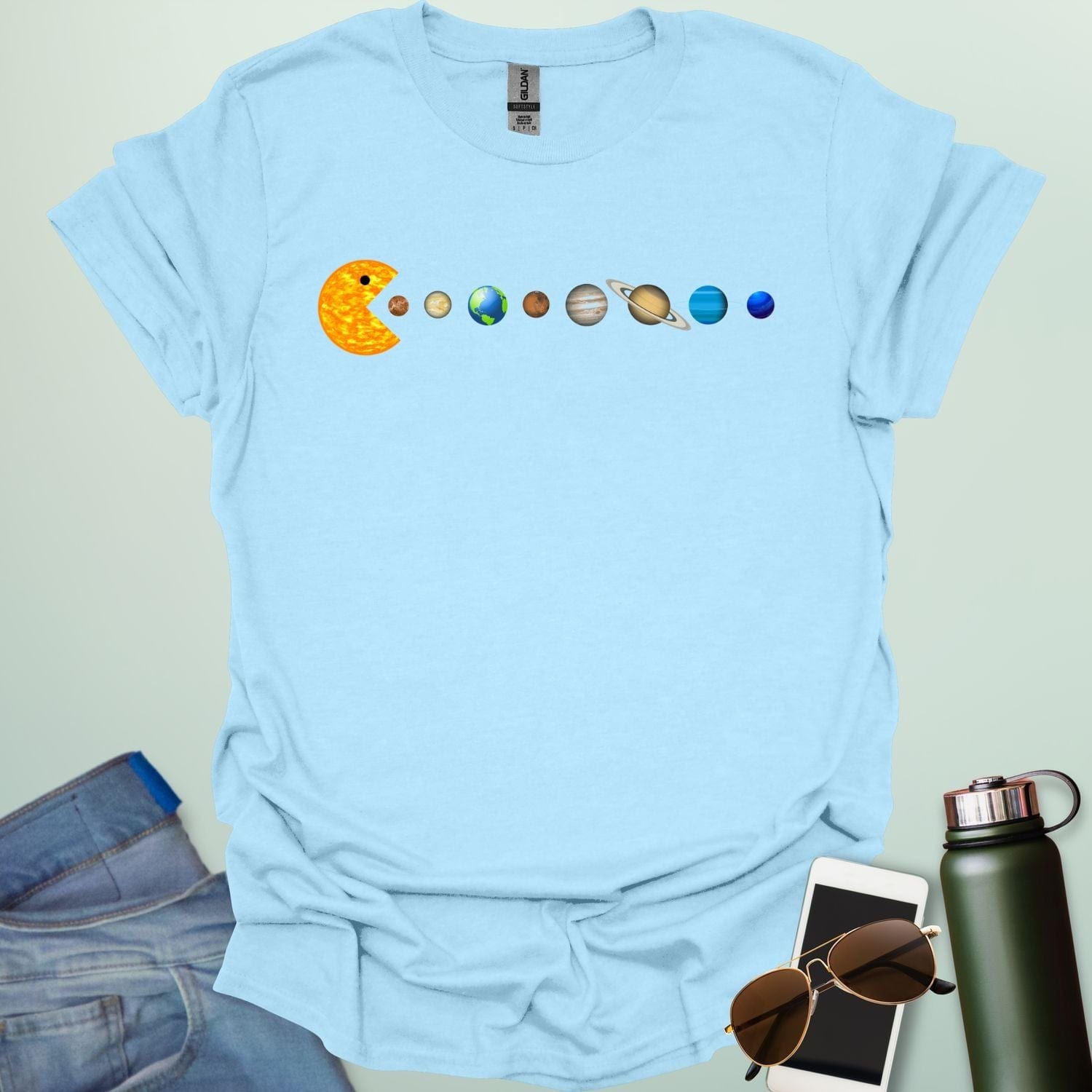 A Pac-Man-like character eating the planets of the solar system, with the sun as its mouth.