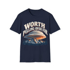 Vintage-style graphic design featuring arched text reading 'WORTH PULLING OVER FOR' above a massive lenticular cloud formation hovering over mountain peaks and pine trees.