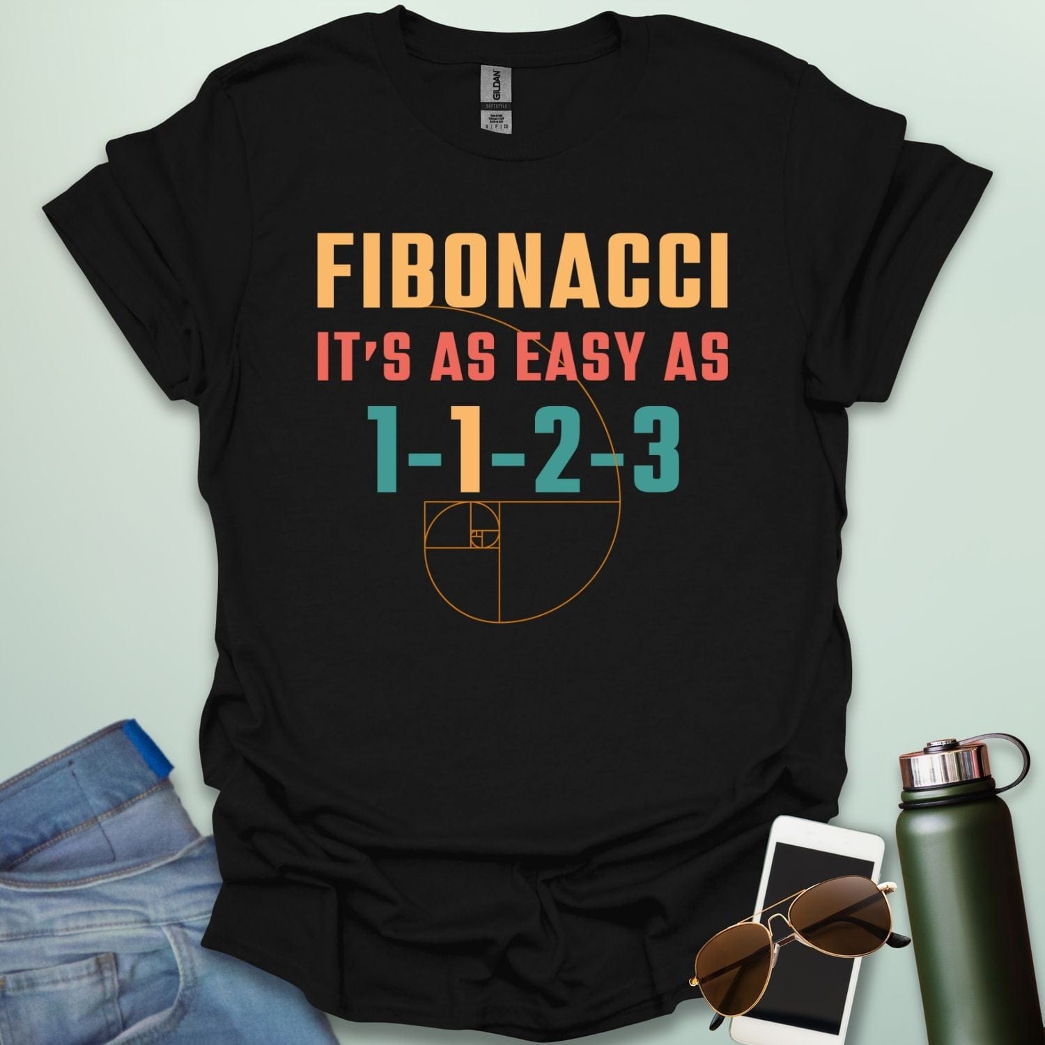 Fibonacci It's As Easy As 1-1-2-3' t-shirt with the Fibonacci spiral graphic.